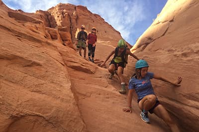 Adventure Ed students descending a canyon wall